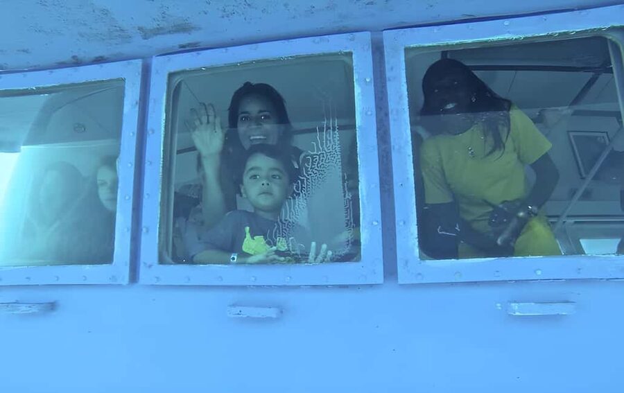 Experience the Exciting Caribbean Underwater World - Boarding the semi-submersible at the public beach