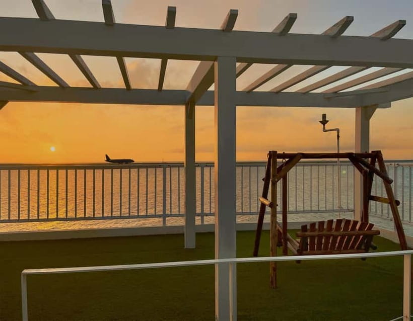 Okinawa: Churaumi Aquarium, Ryukyu Village & Manza Bus Tour - A drink and sea view at Banta Cafe