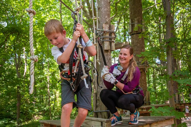 Ziplining and Climbing at The Adventure Park at Virginia Aquarium - The 315-foot zip line over Owls Creek